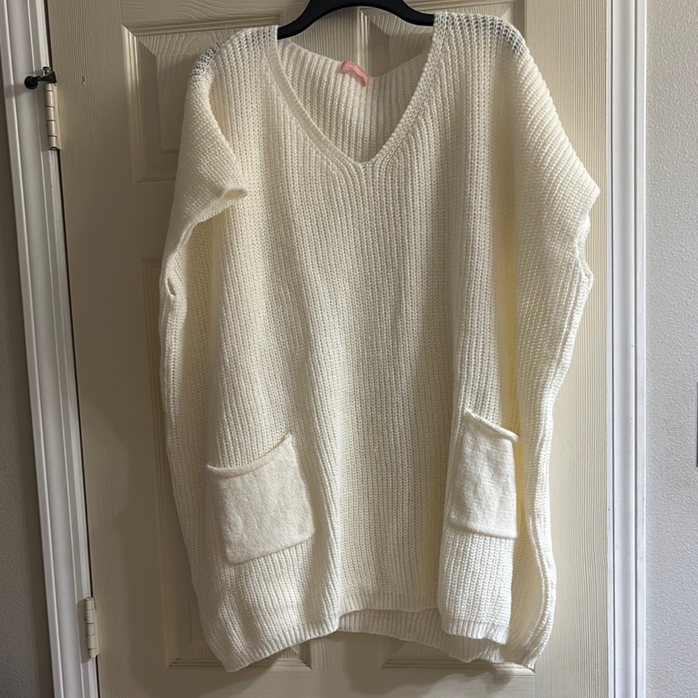 Elegant Ivory V-Neck Sweater with Pockets